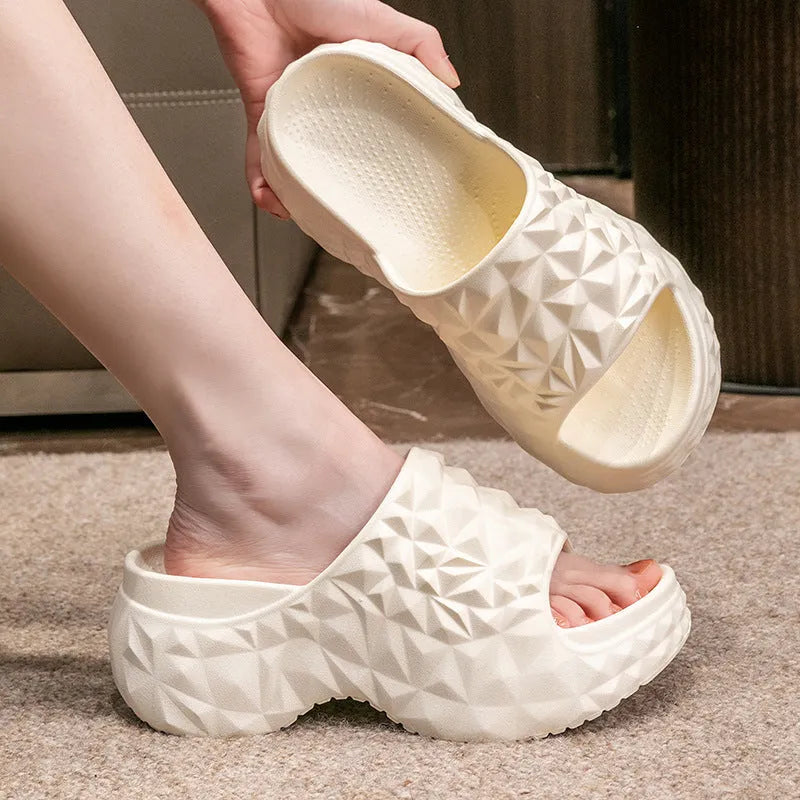 Women's khaki high heel Eva flip flop slippers with a thick sole on a white background.