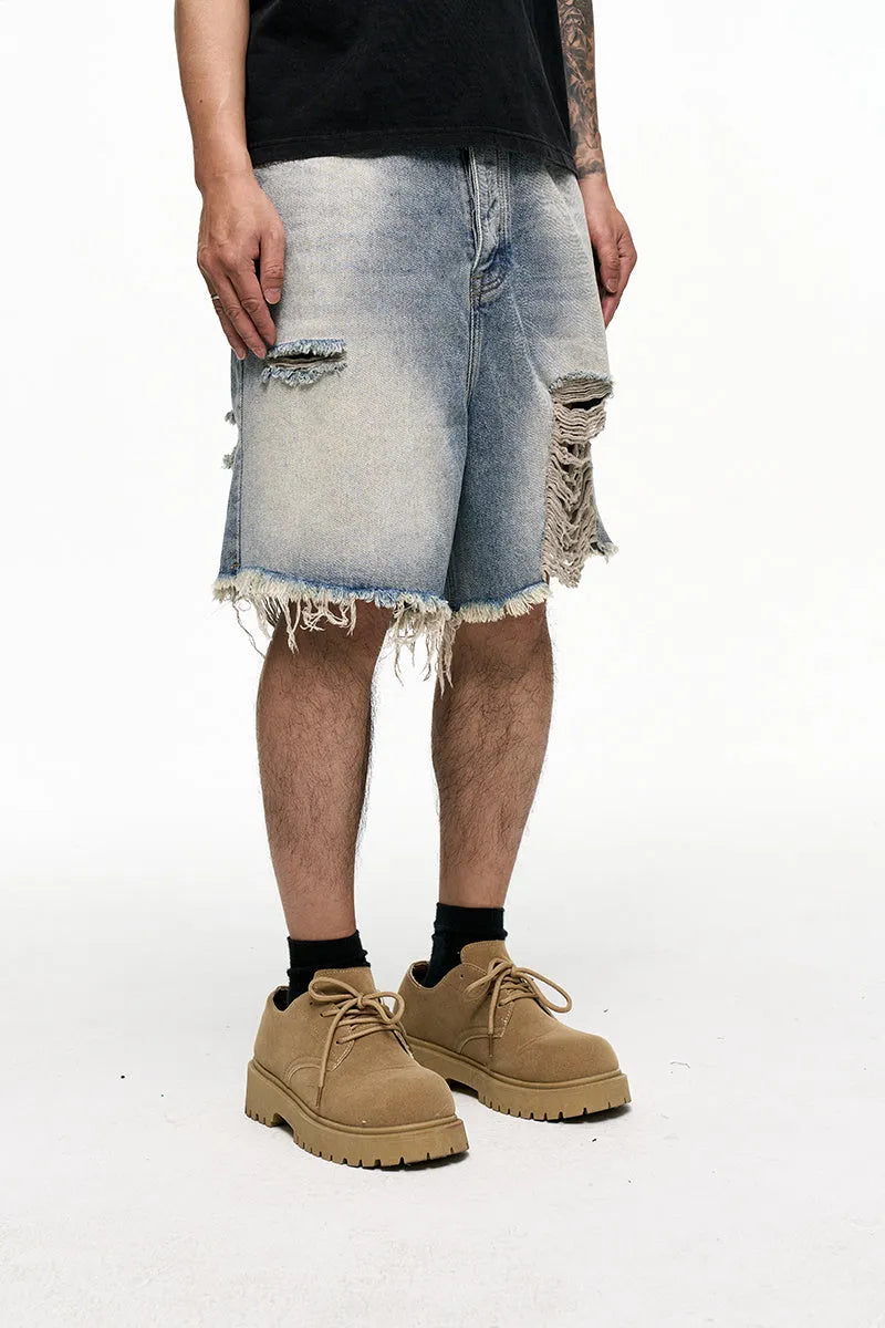 Men's light blue baggy denim shorts with retro washed finish and wide leg design