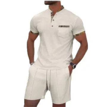 Man modelling a grey zip-front polo collar top and matching shorts, a waffle knit leisure suit set.