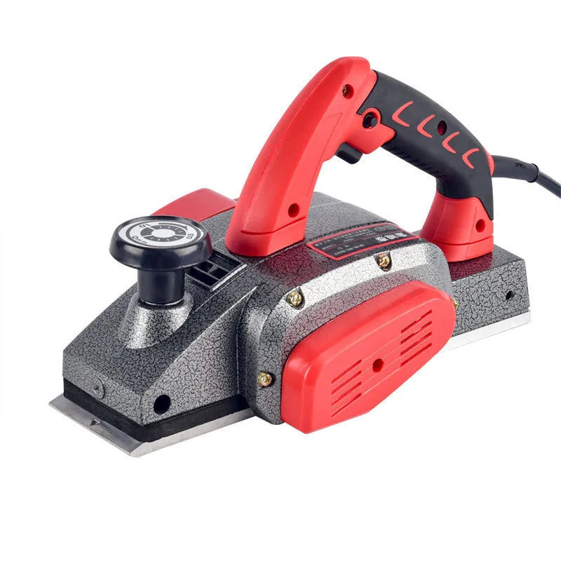 Red aluminium-shell electric wood planer with 82mm planing width and 1400W motor for carpentry tasks.