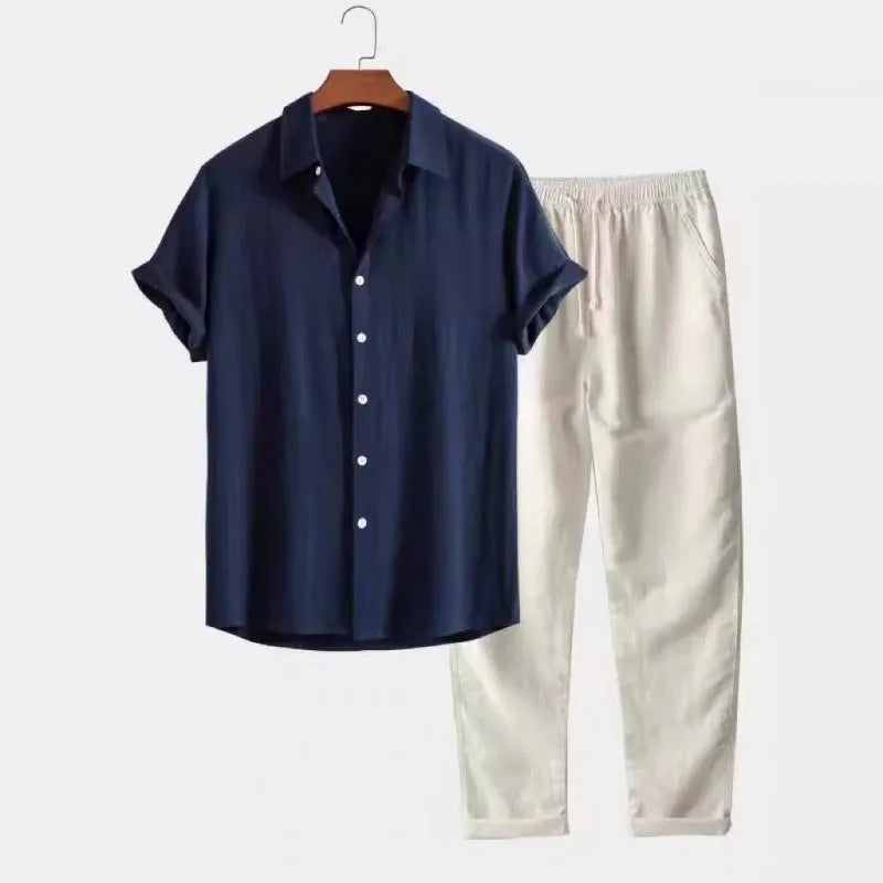 Man wearing a loose fit linen-look short sleeve shirt and matching casual trousers in a neutral colour.