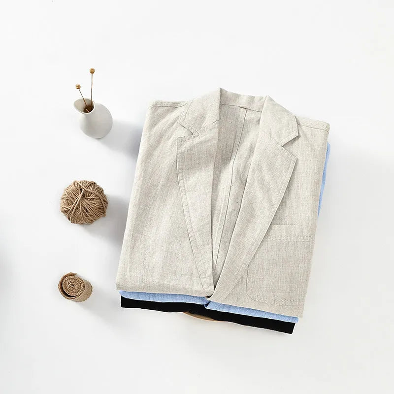 Men's thin linen suit coat in a solid colour with a stick pocket on the chest.