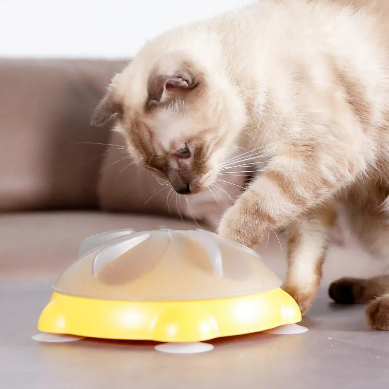 Yellow educational cat puzzle feeder bowl with adjustable difficulty compartments for treat storage