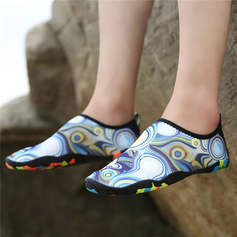 Lycra beach wading shoes in multiple colours with EVA midsoles for swimming.