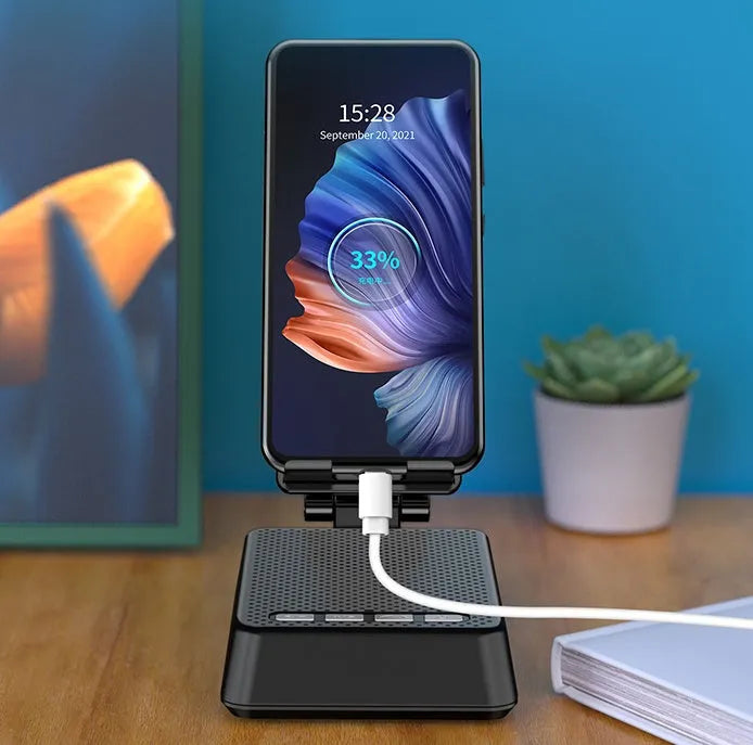 Black mobile phone desk stand with integrated Bluetooth speaker and microphone for live streaming