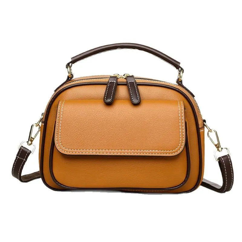 Women's black PU cross-body shoulder bag with square shape and adjustable double straps