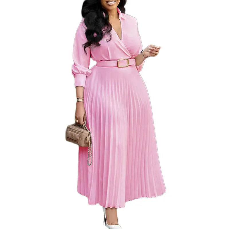 Women's solid colour pleated dress with a detachable belt and 3/4 sleeves, shown in a high waist style.