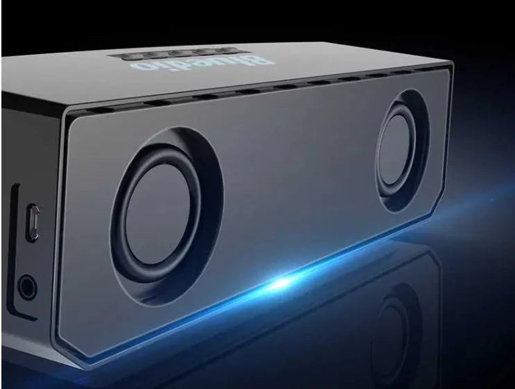 Black cloud smart speaker with compact design and micro-USB port.