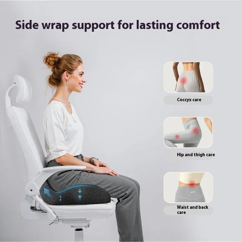 Light grey memory foam office chair cushion on a desk chair.