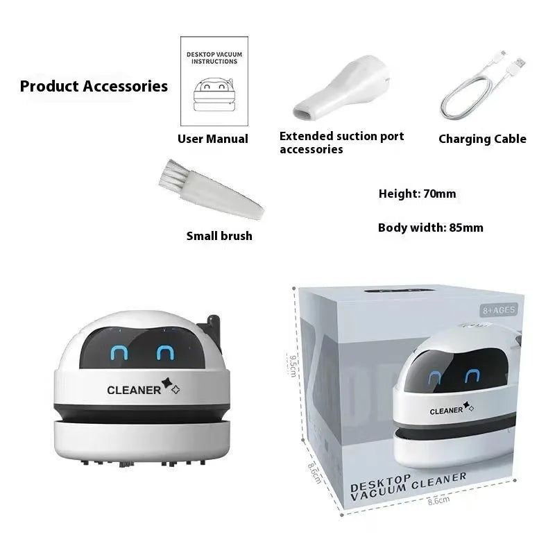 Blue rocket-shaped USB rechargeable handheld desktop vacuum cleaner on a wooden desk next to a keyboard