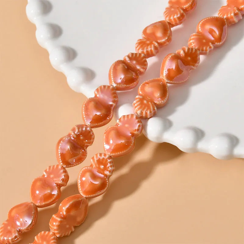 Ceramic love heart small torch beads in multiple colours for jewellery making with straight holes