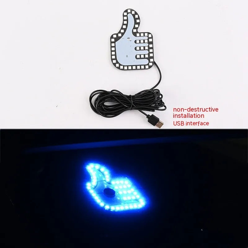 Car USB plug-in LED finger gesture lights showing thumbs up, OK, and scissor hand designs.