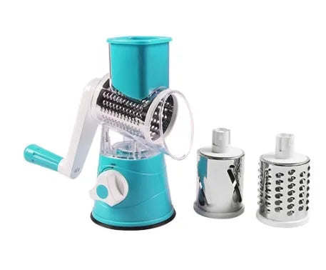 Rotary hand drum grater with stainless steel blades for julienning carrots and potatoes, available in blue, green, or red.