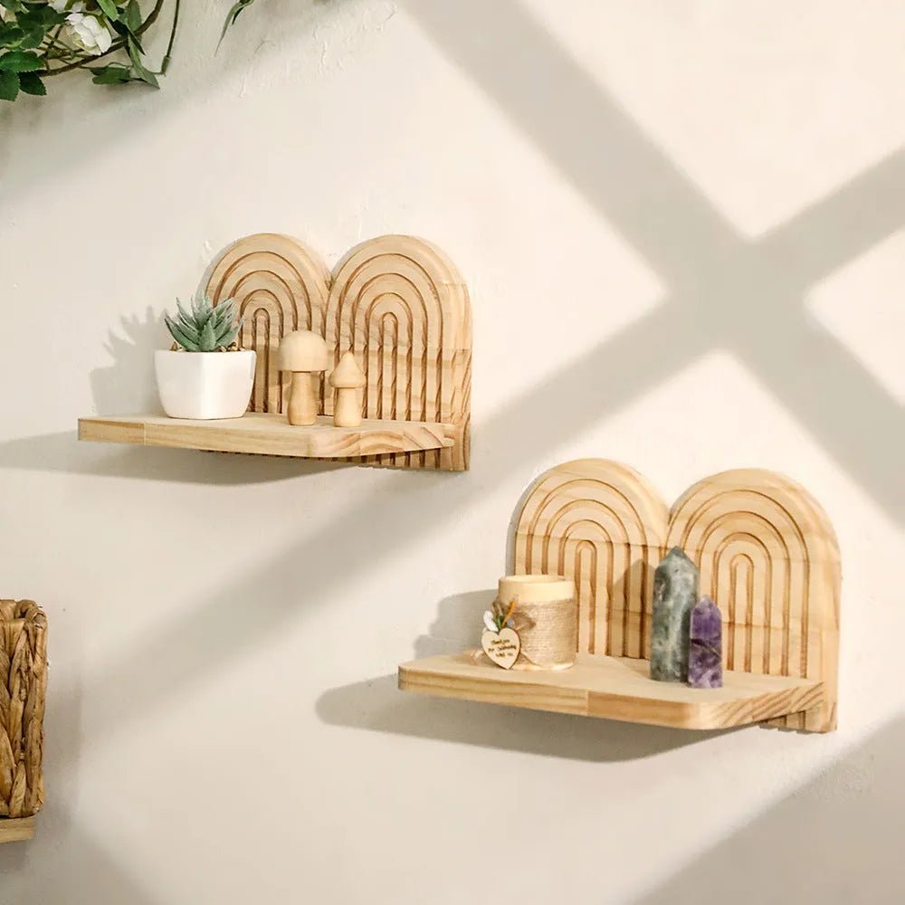 Solid wood multi-layer wall rack holding several flower pots for home decoration.