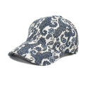 Paisley pattern printed baseball cap in blue with dome crown style on a white background.