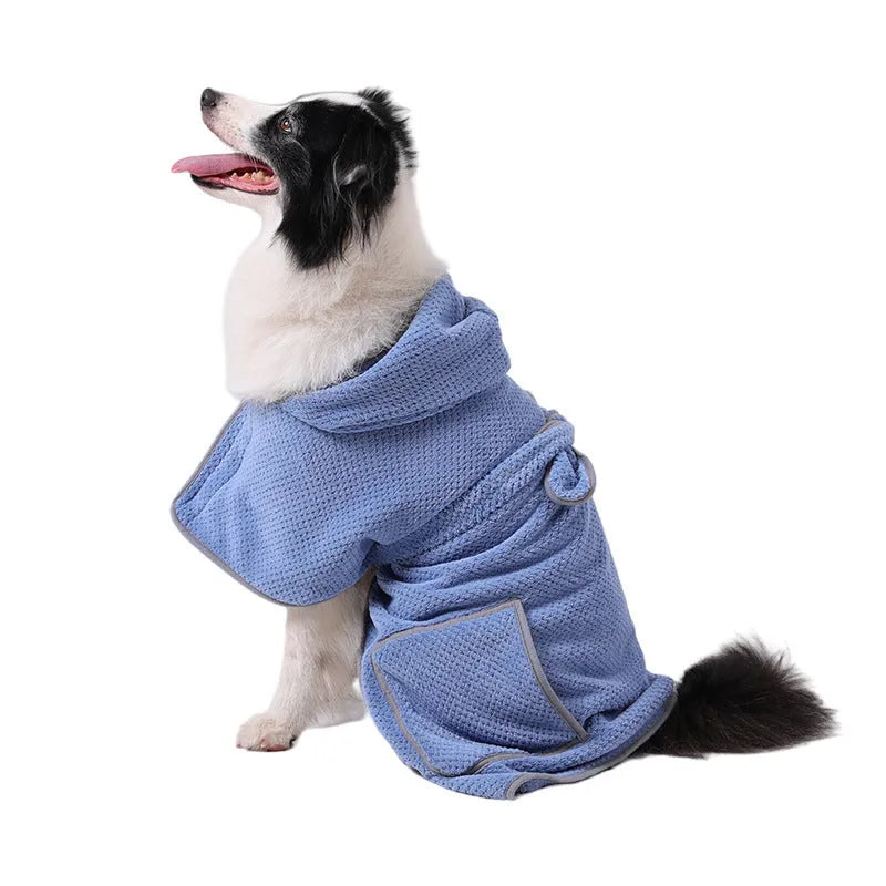 Blue adjustable dog bath robe towel drying a golden retriever after a bath.