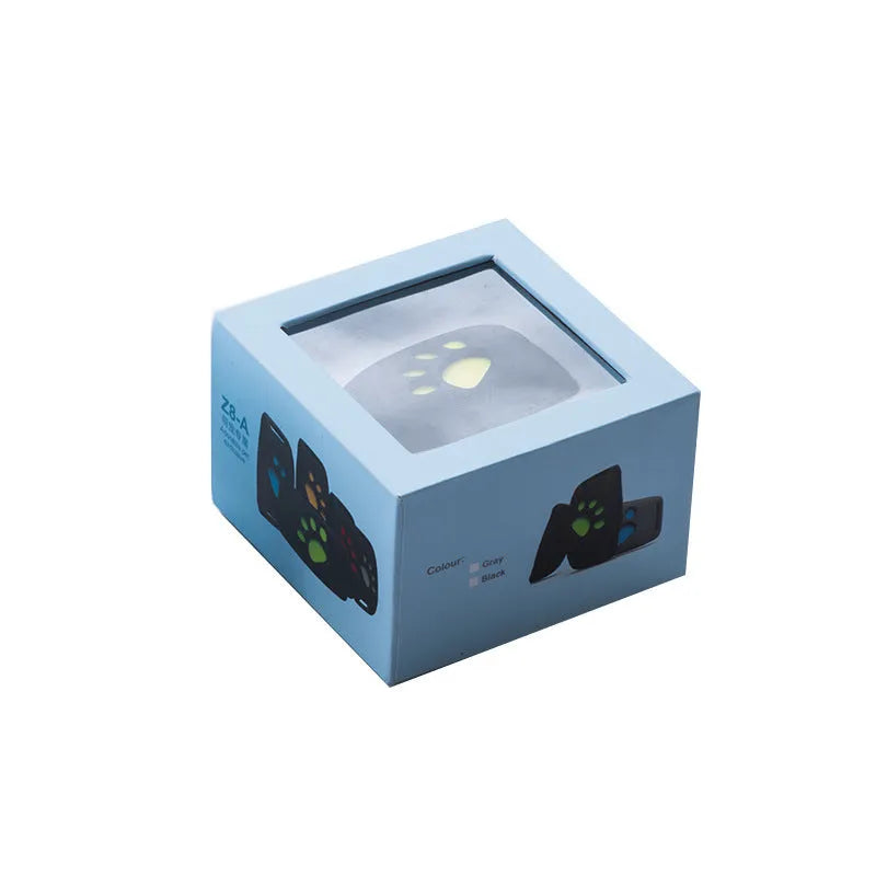 Compact black and yellow waterproof GPS pet tracker device with dimensions 65.5mm by 37mm.