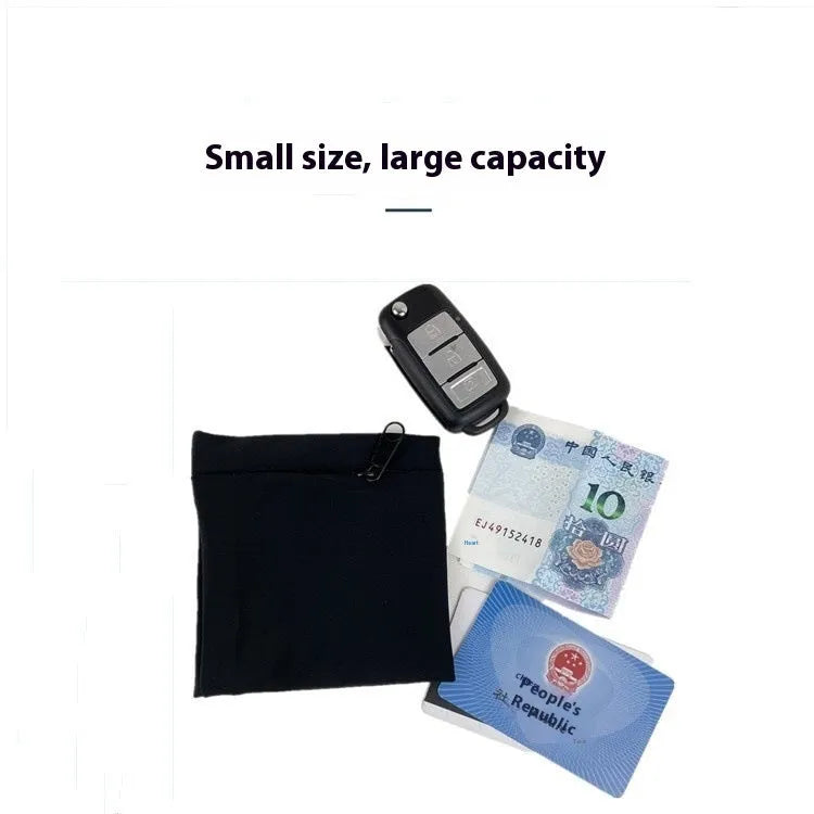 Black wrist sleeve bag with a mobile phone inserted, showing hands-free design on a person's wrist.