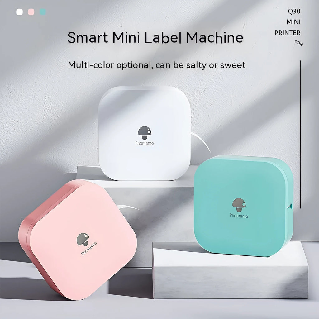 Q30 thermal mini label printer in green, compact size 82x82x32mm, with self-adhesive paper roll on white background
