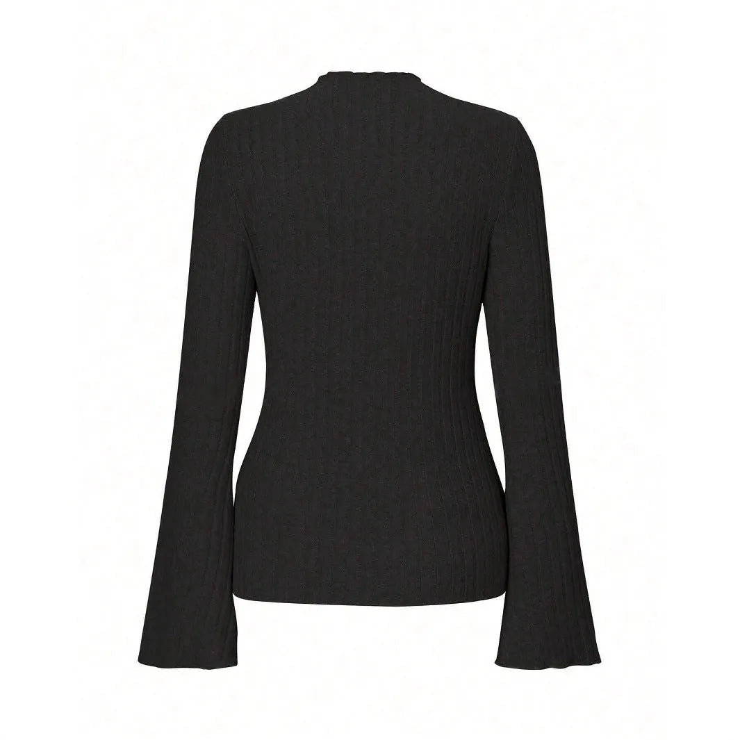 Long sleeve casual top in black with lantern sleeves and a sunken stripe pattern, laid flat.