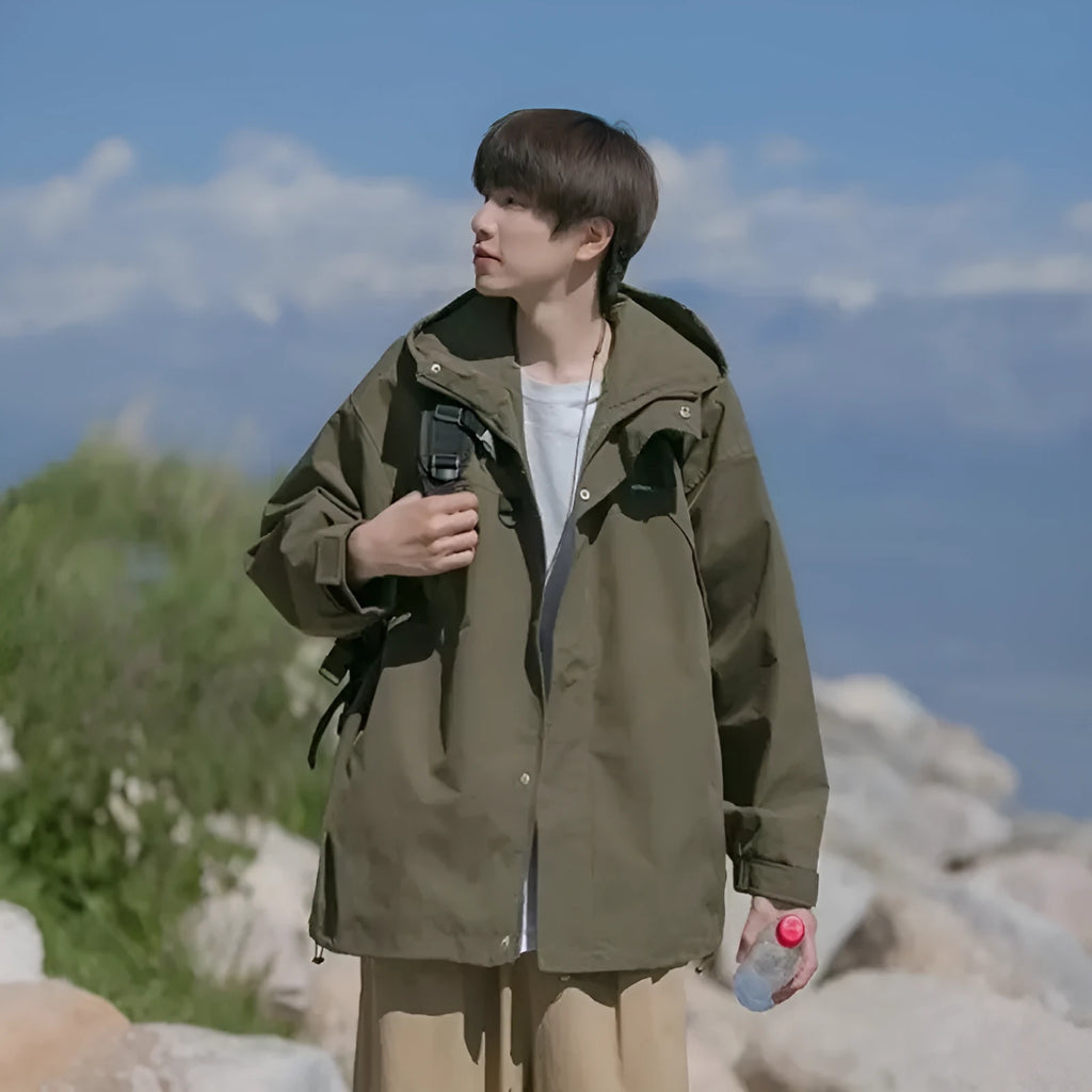Men's windproof jacket in military green, loose fit, hooded, long sleeves, polyester, casual coat for autumn.