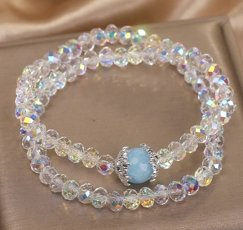 White crystal double ring bracelet for women with electroplated finish on light background