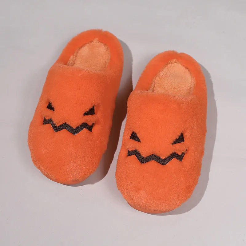 Orange women's Halloween pumpkin slippers with plush lining and a non-slip PVC sole