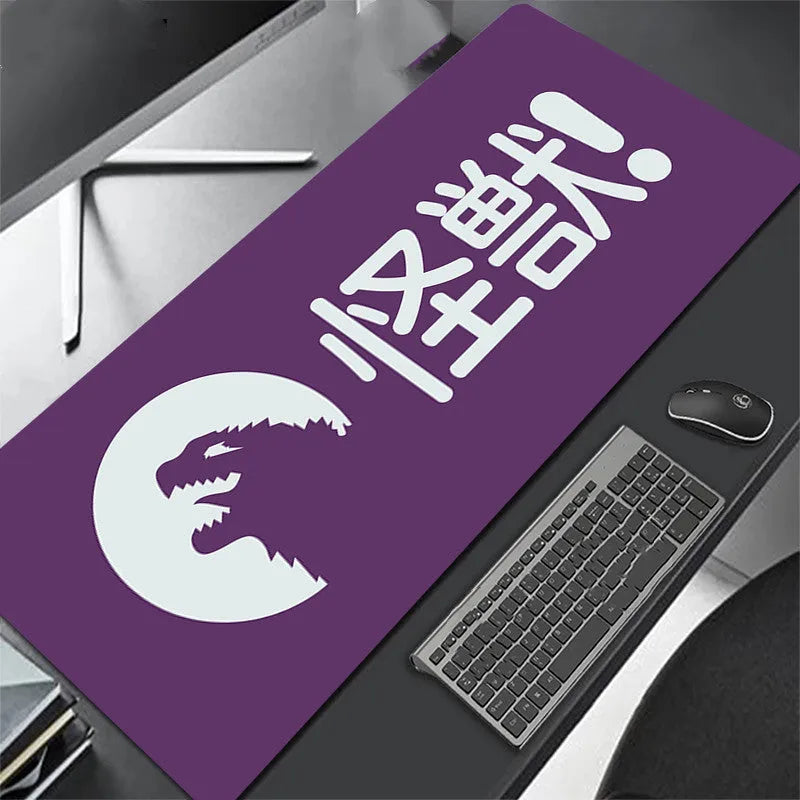 All black extra long mouse pad with precision overlock stitching on a desk