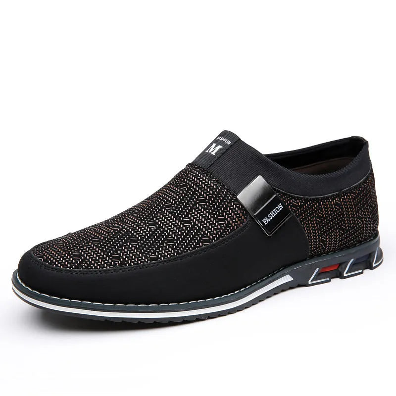 Men's grey and white synthetic leather slip-on casual shoes with a square toe and flat rubber sole.