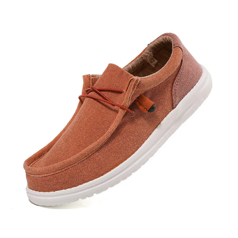 Men's casual canvas shoes in green or orange with mosaic splicing design and rubber soles