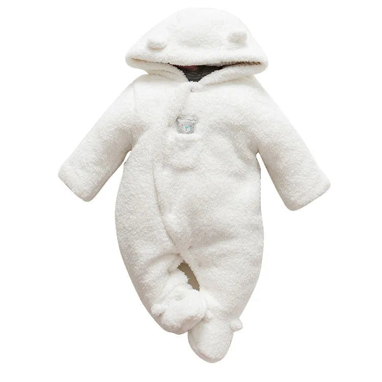 Baby wearing a cotton padded winter jumpsuit with long sleeves, available in marrón, pink, or white colours.