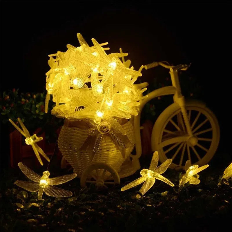 30 LED solar string lights with warm white bulbs and separate solar panel for garden decoration