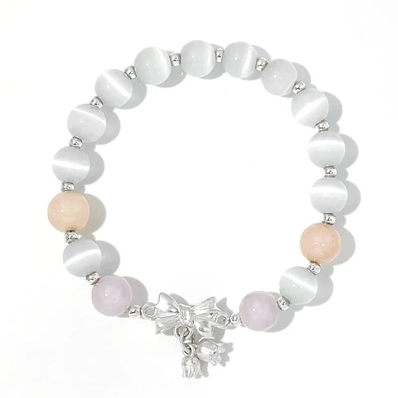 Lavender purple crystal bracelet with bowknot design measuring 10mm for women's fashion.
