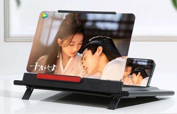 Black 12-inch pull-out screen amplifier showing horizontal and vertical phone bracket positions with Fresnel lens