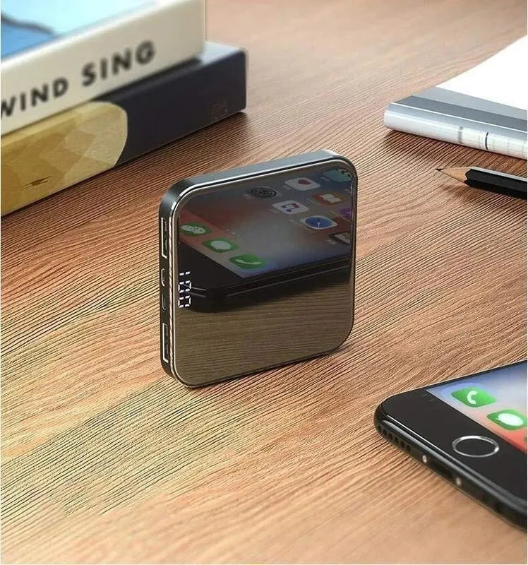 Ultra-thin mirror mini charging bank with LCD display and alloy shell in rose gold finish