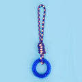 Blue, red, and rose red braided rope dog toy with a large central knot.