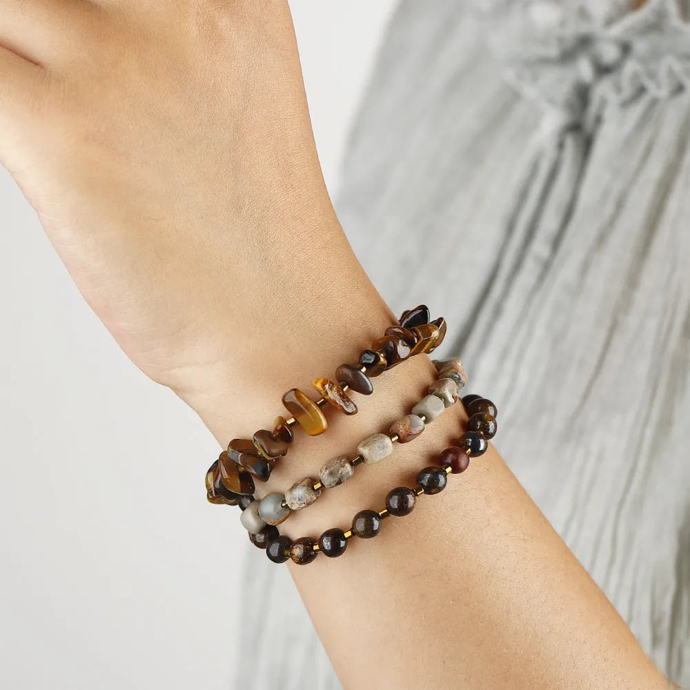Tigereye stone and bronze geometric bracelet with texture details and bends design