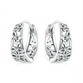 Sterling silver retro hollow butterfly earrings with zircon stones measuring 14mm x 5mm