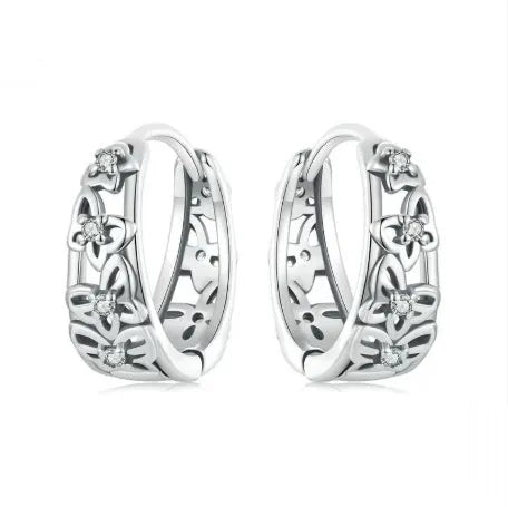 Sterling silver retro hollow butterfly earrings with zircon stones measuring 14mm x 5mm