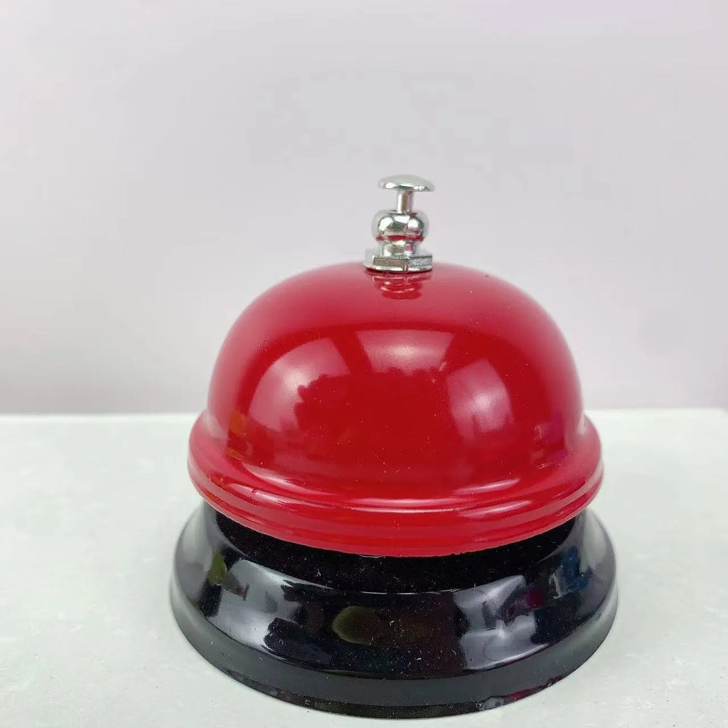 Iron classroom game bell in one of ten colours: blue, green, pink, red, or yellow.