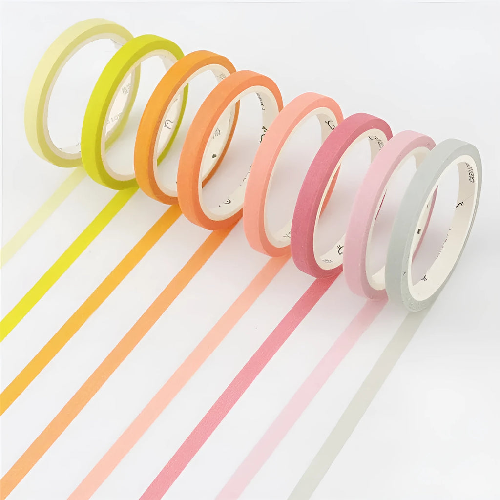 Roll of solid colour paper tape in 5mm width, shown in crimson and deep purple options