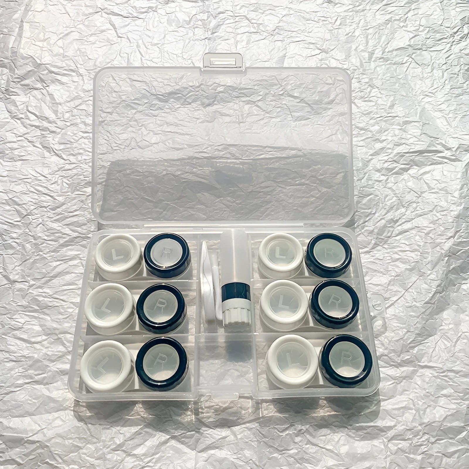 Portable rectangular contact lens case with vibration cleaning in multiple colour options