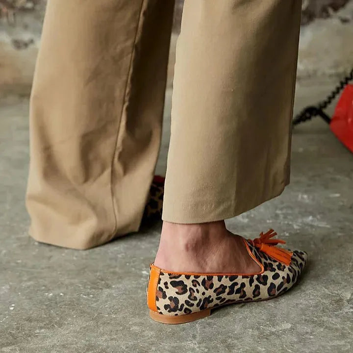 Womens pointed toe leopard print loafers with low chunky heel and rhinestone decoration on PU upper