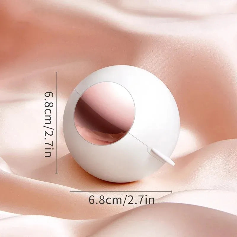 Reusable ABS hair removal ball lint roller in pink, showing handle and sticky roller surface.