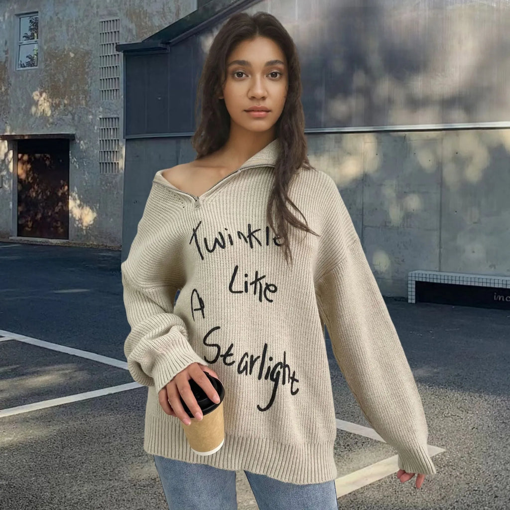 Women's light khaki alpaca wool pullover sweater with a diagonal oblique zipper and a loose lapel turtleneck collar.
