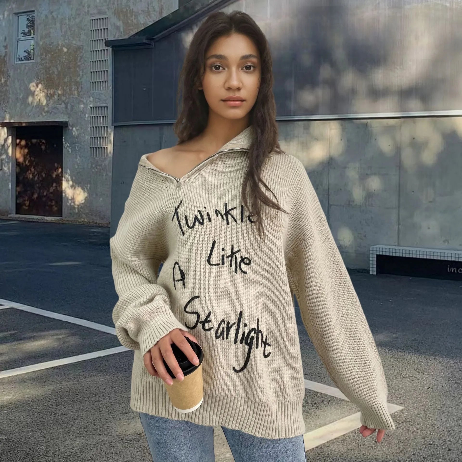 Women's light khaki alpaca wool pullover sweater with a diagonal oblique zipper and a loose lapel turtleneck collar.