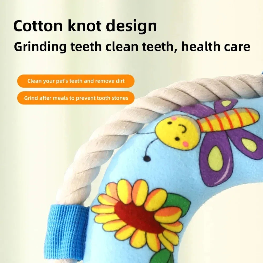Soft plush dog pull ring chew toy with squeaker in yellow fish design.
