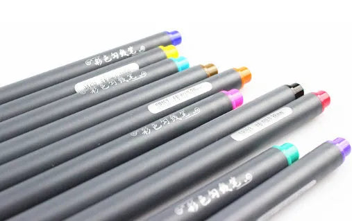Set of ten 15.8cm long black hook line pens with 0.38mm tips for technical drawing.