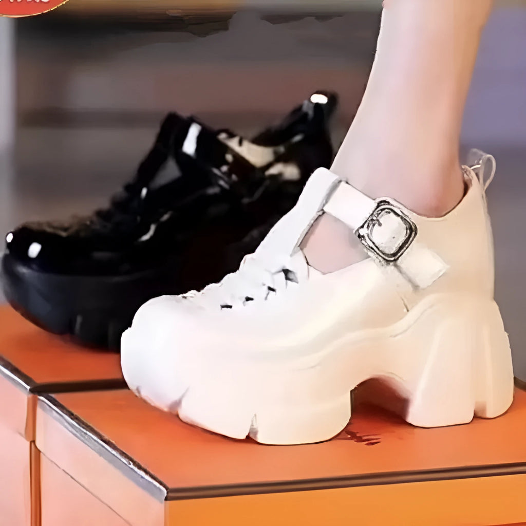 Women's black and white Roman style chunky heel pumps with satin upper and hollow out pattern