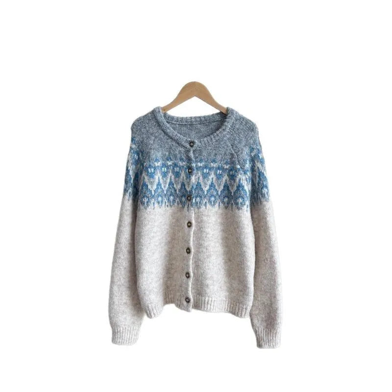 Women's beige jacquard patterned thick knit sweater coat with a loose fit and long sleeves.